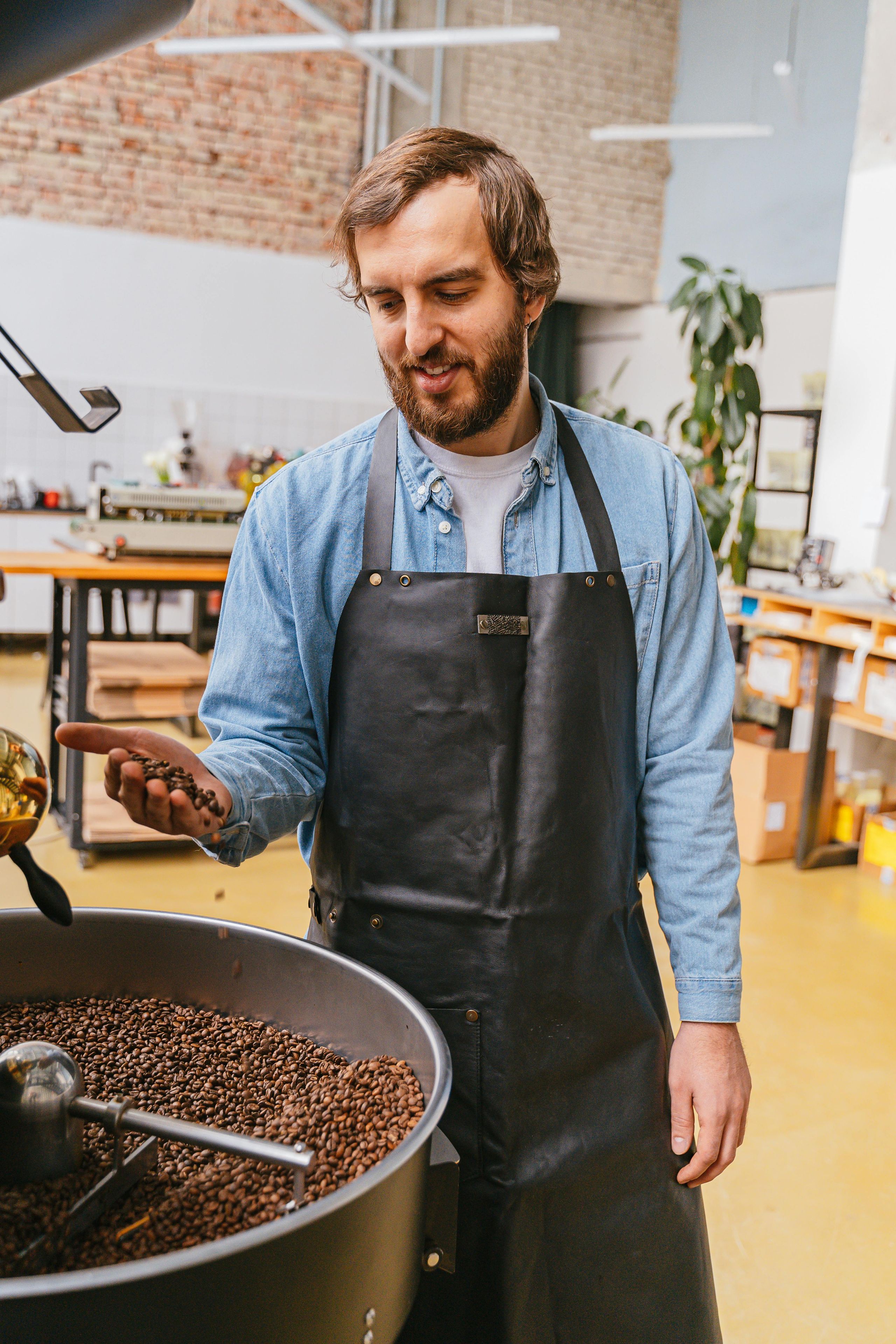 Woman smelling coffee beans